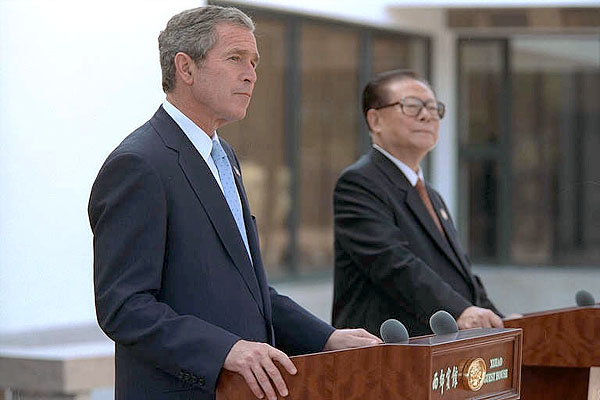 President George W. Bush and Chinese President Jiang Zemin deliver a joint statement to the media in Shanghai, People's Republic of China, Oct. 19.