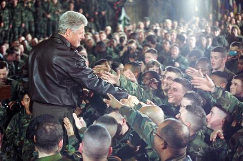 President Clinton greets troops during his visit to Tuzla Air Force Base in Bosnia-Herzegovina